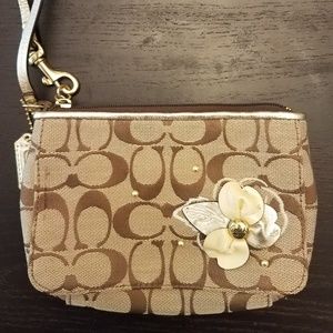 3d flower Coach mini clutch